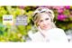 Bride in floral headband with award logos and lush background.