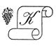 Ein Kalligrafie-Buchstabe "K" auf einer Schriftrolle, daneben eine Weintraube.