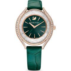 Reloj verde esmeralda con correa de piel y detalles dorados y brillantes.
