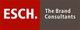 Rotes und graues Logo mit Schriftzug: "ESCH. The Brand Consultants".