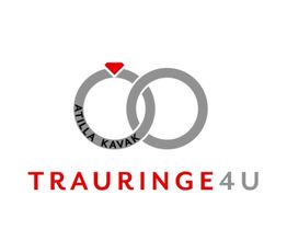 Zwei graue Ringe mit rotem Diamant. Text: "ATILLA KAVAK TRAURINGE4U".