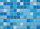 Blue mosaic tile pattern with various shades, creating a textured geometric design.