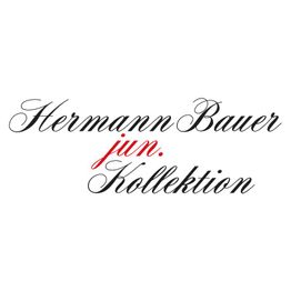 Text in geschwungener Schrift: "Hermann Bauer jun. Kollektion" auf weißem Hintergrund.