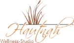 Logo von Hautnah Wellness-Studio mit stilisierten Grashalmen.