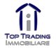 Logo di "Top Trading Immobiliare" con icona stilizzata di una casa in blu e grigio.