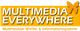 Gelbes Logo mit "MULTIMEDIA EVERYWHERE", Schmetterling oben rechts. Text darunter: Werbe- und Infosysteme.