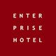 Scritta bianca su fondo rosso: "Enterprise Hotel".