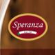 Logotipo oval da "Speranza" com as palavras "Dal 1958" no centro. Fundo marrom.