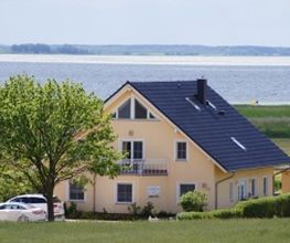 Ferienhaus Am Achterwasser Logo