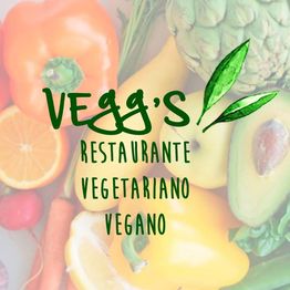 Imagem de frutas e legumes coloridos com texto "Vegg's: Restaurante Vegetariano Vegano".