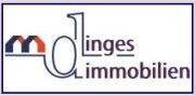 Logo von "Dinges Immobilien" mit stilisiertem Hausdach und Schriftzug in einem blauen Rahmen.