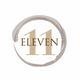 "Number 11 with 'Eleven' text inside a stylized circular brush stroke."