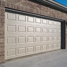 White garage door with a brick wall background.
