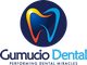 Logo of Gumucio Dental with colorful tooth design and tagline "Performing Dental Miracles."
