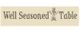 "Well Seasoned Table" text with fork, spoon, and herb graphic on a beige background.