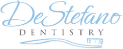 Logo of DeStefano Dentistry with elegant cursive and blue accents.