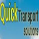 Blurry "Quick Transport Solutions" text on a blue sky background.