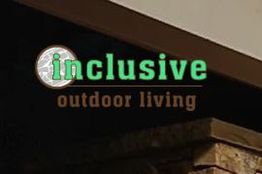 Sign reading "inclusive outdoor living" with a circular design on a building facade.