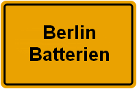 Ein gelbes Schild mit der Aufschrift "Berlin Batterien".