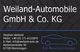 Visitenkarte von Weiland-Automobile GmbH & Co. KG mit Kontaktinformationen und Auto-Logo.
