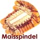 Halbe Maiskolbenscheibe mit dem Wort "Maisspindel" darunter geschrieben.