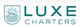 Logo of Luxe Charters with a sun and boat icon.