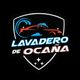 Logotipo de "Lavadero de Ocaña" con un coche y gotas de agua sobre fondo negro.