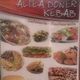 Menú de Altea Doner Kebab con fotos de diversos platos como kebab, ensaladas y más.