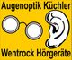 Gelbes Schild mit Brille und Ohr, Text: "Augenoptik Küchler, Wentrock Hörgeräte".