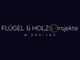 Schwarzes Logo mit der Aufschrift "FLÜGEL & HOLZ Projekte M.ERNICKE" in weißer Schrift.