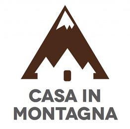 Logo con montagna stilizzata e testo "Casa in montagna" sotto.