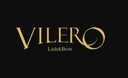 "Vilero Lash & Brow logo with stylish gold text on a black background."