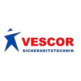Logo mit blauem Stern links und rotem Text "VESCOR", darunter "SICHERHEITSTECHNIK" in Blau.