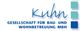 Logo mit blauem Schriftzug "Kuhn" und Text "Gesellschaft für Bau- und Wohnbetreuung mbH".