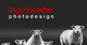 Eine Herde Schafe vor schwarzem Hintergrund, darüber der Text "Ingo Boelter photodesign".