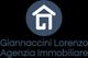 Logo blu con casa stilizzata, testo: "Giannaccini Lorenzo Agenzia Immobiliare".