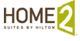 Logo of Home2 Suites by Hilton with a green stylized number 2.