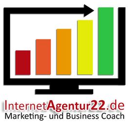Balkendiagramm auf Bildschirm mit Text: "InternetAgentur22.de Marketing- und Business Coach".