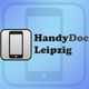 Icon eines Smartphones mit dem Text "HandyDoc Leipzig" auf blauem Hintergrund.