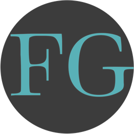 Cerchio grigio con le lettere "FG" in azzurro al centro.