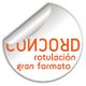 Etiqueta redonda con texto naranja: "CONCORD rotulación gran formato".