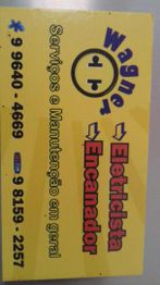 Cartão de visita amarelo de eletricista e encanador com contatos e serviços oferecidos.