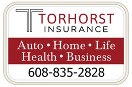 Torhorst Insurance sign with contact number and services: Auto, Home, Life, Health, Business.