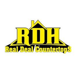 "Yellow RDH Real Deal Countertops logo with a house-shaped background."
