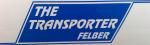 Blaues Schild mit weißem Text: "THE TRANSPORTER FELBER".