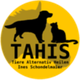 Gelbes Logo mit der Silhouette eines Hundes und einer Katze, Text: TAHIS, Tiere Alternativ Heilen.