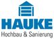 Logo der Firma Hauke mit einem blauen Haus-Symbol und Text "Hochbau & Sanierung".