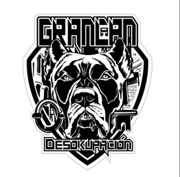 Dibujo de un perro en escudo con texto "Gran Can Desokupación" y una llave.