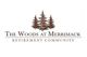 Logo: Three pine trees above the text "The Woods at Merrimack Retirement Community".