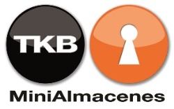 Dos círculos: uno negro con "TKB", otro naranja con un ojo de cerradura. Texto: "MiniAlmacenes".